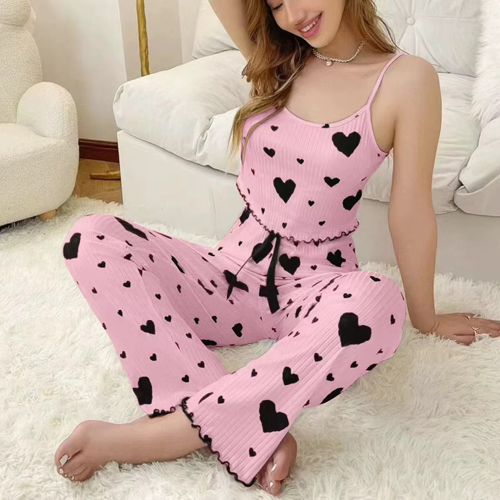 Pijama rosa de dos piezas con pantalón largo y corazones