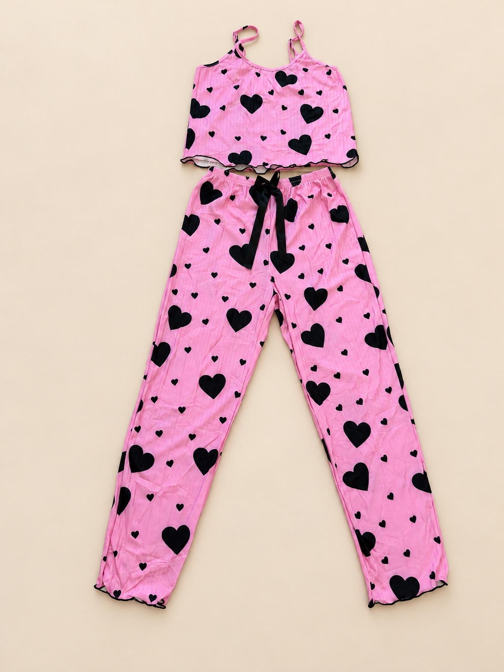 Pijama rosa de dos piezas con pantalón largo y corazones