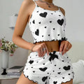 Pijama de short con tirantes y corazones negros